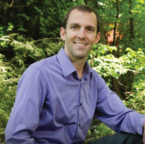Christopher J. Toth, DMD outside in a purple button down shirt